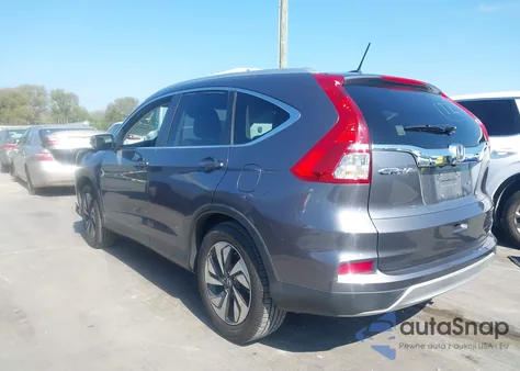 2016 Honda Cr-V Touring z USA, uszkodzony, nr VIN 5J6RM3H95GL025401